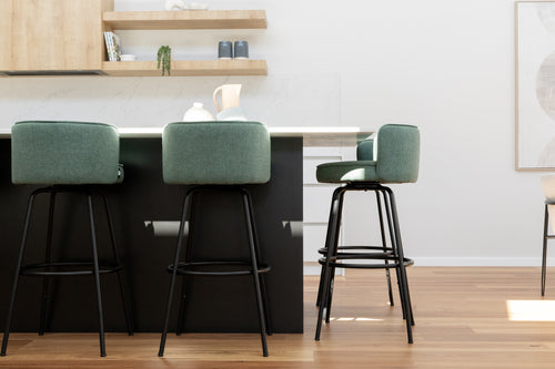 Stylish sara bar stool swivels arranged in a modern kitchen setting