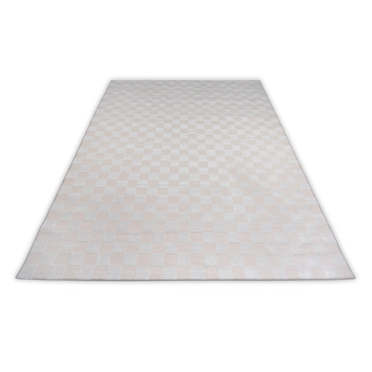 Checkered pink and cream soft rug