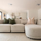 Plush sofa styled in a modern interior setting