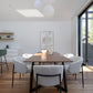 Minimalist dining table in soft natural wood
