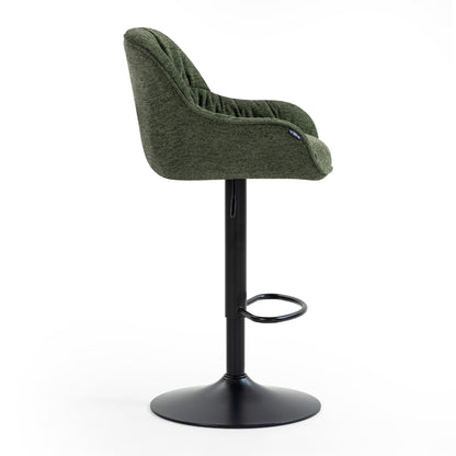 Comfortable green swivel armchair