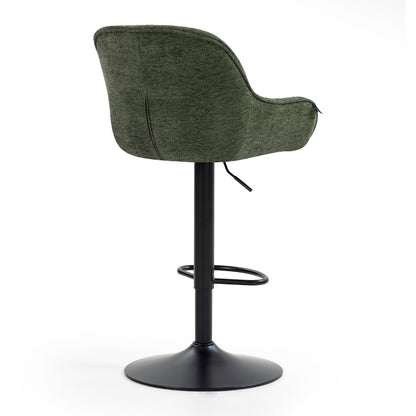 Comfortable green swivel armchair