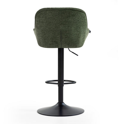 Comfortable green swivel armchair