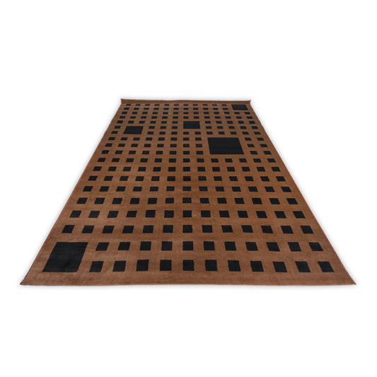 Black and orange geometric rug 