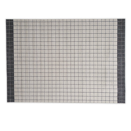 Cream and black lined rug